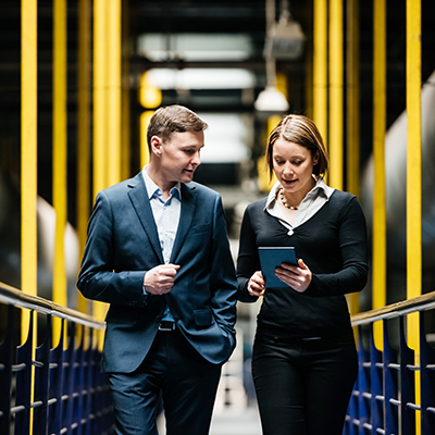 Employees walking in a warehouse